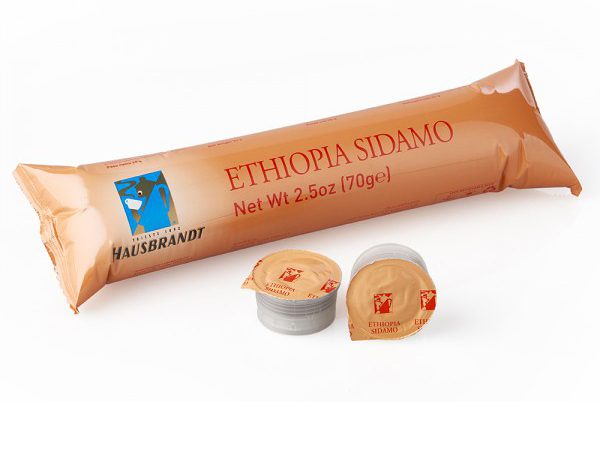 Hausbrandt Ethiopia Sidamo espreso kafa u kapsuli. Koristi se za Guzzini espresso aparat za kafu. 100% Arabika zrna iz Etiopije. Mokro oprana kafa.